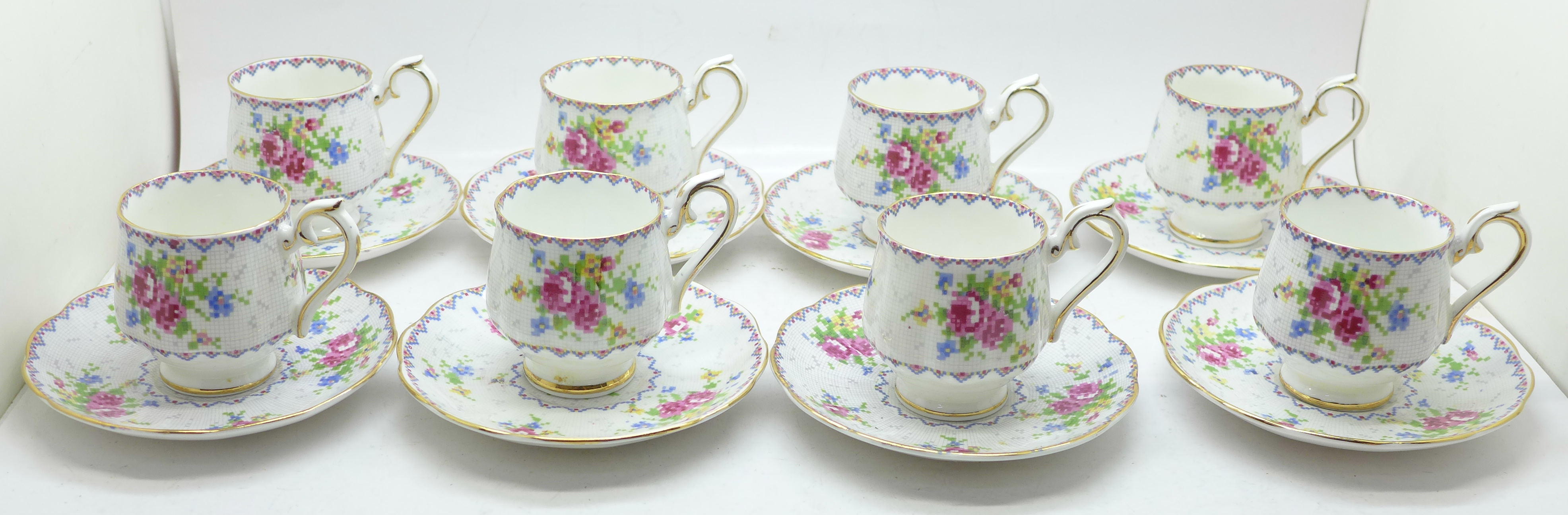 A Royal Albert Petit Point Chintz pattern demitasse cups and saucers