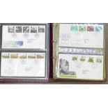 Stamps; GB first day covers in two Royal Mail albums, all typed addresses and special Post Office