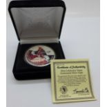 A 2005 The Morgan Mint Elvis Celebrates Vegas Centennial Silver Eagle coin, one ounce fine silver,