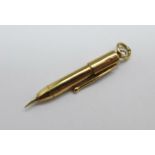 A novelty 9ct gold fountain pen charm, mark worn, 0.7g