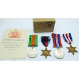 A set of four WWII medals with box and slip