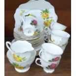 A collection of Royal Stafford decorative teawares and four Royal Albert June Delight cups and