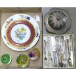 Three glass paperweights, a Limoges plate, one other decorated with flowers, a muffin dish, plated