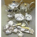 A silver plated three piece tea service, plated cutlery and other flatware