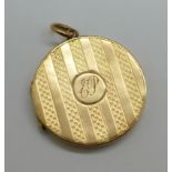 A 9ct gold back and front locket, total weight 4.6g, with initials