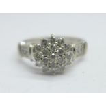 A 9ct white gold and diamond ring, 0.5carat diamond weight, marked in the shank, 2.7g, N