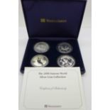 The 2006 Famous World Silver Coin Collection, four coins, all one ounce fine silver, with case