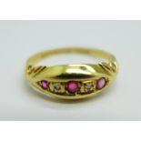 An 18ct gold, ruby and diamond ring, Birmingham 1911, 1.6g, N