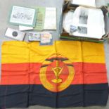 A collection of Militaria; ephemera, map, German Mother's Cross medal, reproduction cigarette box,