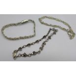 Twenty-five silver necklaces