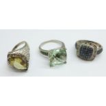 Three silver gem set rings