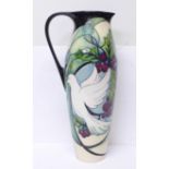 A Moorcroft jug, Cathedral Window doves, 27cm, second