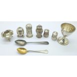 A Georgian silver egg cup, two silver spoons, (one 800 silver), and six silver condiments, 134g