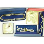 Five simulated pearl necklaces, boxed