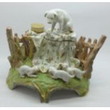 A continental figural inkwell