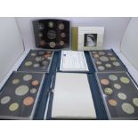 Five Royal Mint uncirculated coin year packs