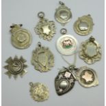Ten silver fobs, 73g, and one white metal fob, one loop a/f