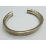 A heavy hallmarked silver bangle, 104g