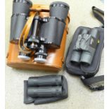 A pair of Regent 7x50 binoculars and two other pairs