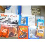 A collection of war related books, photograph album of scenes of Jerusalem and Concorde