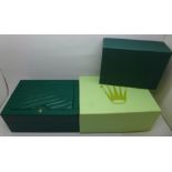 A Rolex watch box, outer box and one other green watch box and outer box