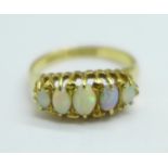 An 18ct gold and five stone opal ring, Birmingham 1925, 3.8g, Q