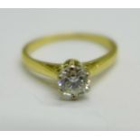 An 18ct gold, diamond solitaire ring, 0.4carat diamond weight, 2.6g, M