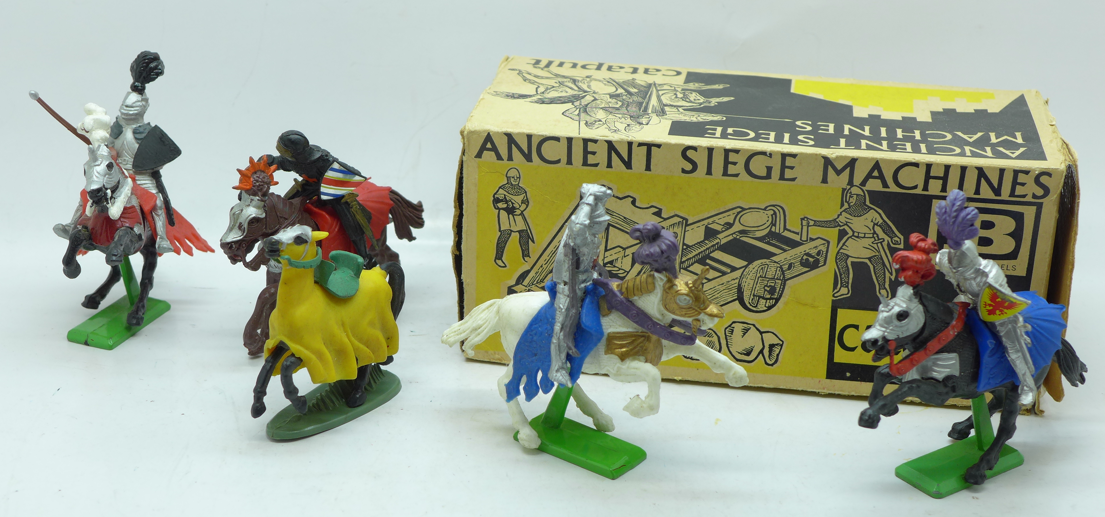 Britains Ancient Siege Machines catapult, a crossbow, and Britains figures (26) with accessories