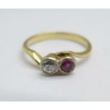A yellow metal, diamond and ruby ring, 2.6g, L, tests as 18ct gold