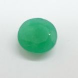 An unmounted emerald stone with valuation certificate, 10.46 carat weight