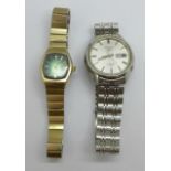 Two Seiko wristwatches;- 5 automatic with day and date, and a lady's automatic Hi-Beat with green