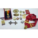 A Belgian medal, other medals and badges including Butlins Clacton