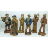 Six Black Forest carved wooden figures