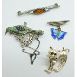 Four silver brooches including an enamelled butterfly drop brooch