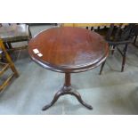 A Victorian mahogany circular tripod table