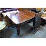 A small Victorian mahogany extending dining table