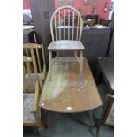 An Ercol Blonde drop-leaf table and a chair