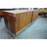 A teak and chrome ended sideboard