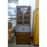 An oak bureau bookcase