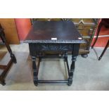 A Victorian carved ebonised square occasional table