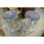 A pair of aluminium bar stools