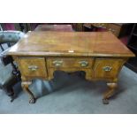 A George I style walnut three drawer side table