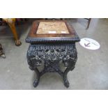 A Chinese padouk wood and marble topped jardiniere stand