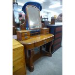 A Victorian walnut dressing table