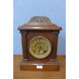 A 19th Century American Waterbury Clock Co. oak bracket clock