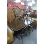 An Ercol refectory table and six chairs