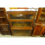 A Globe Wernicke oak three tier sectional stacking bookcase