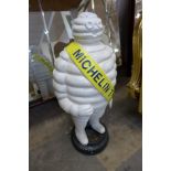 A cast iron Michelin Tyres advertising figure