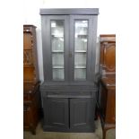 A Victorian style painted four door bookcase