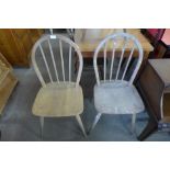 A pair of Ercol Blonde Windsor chairs